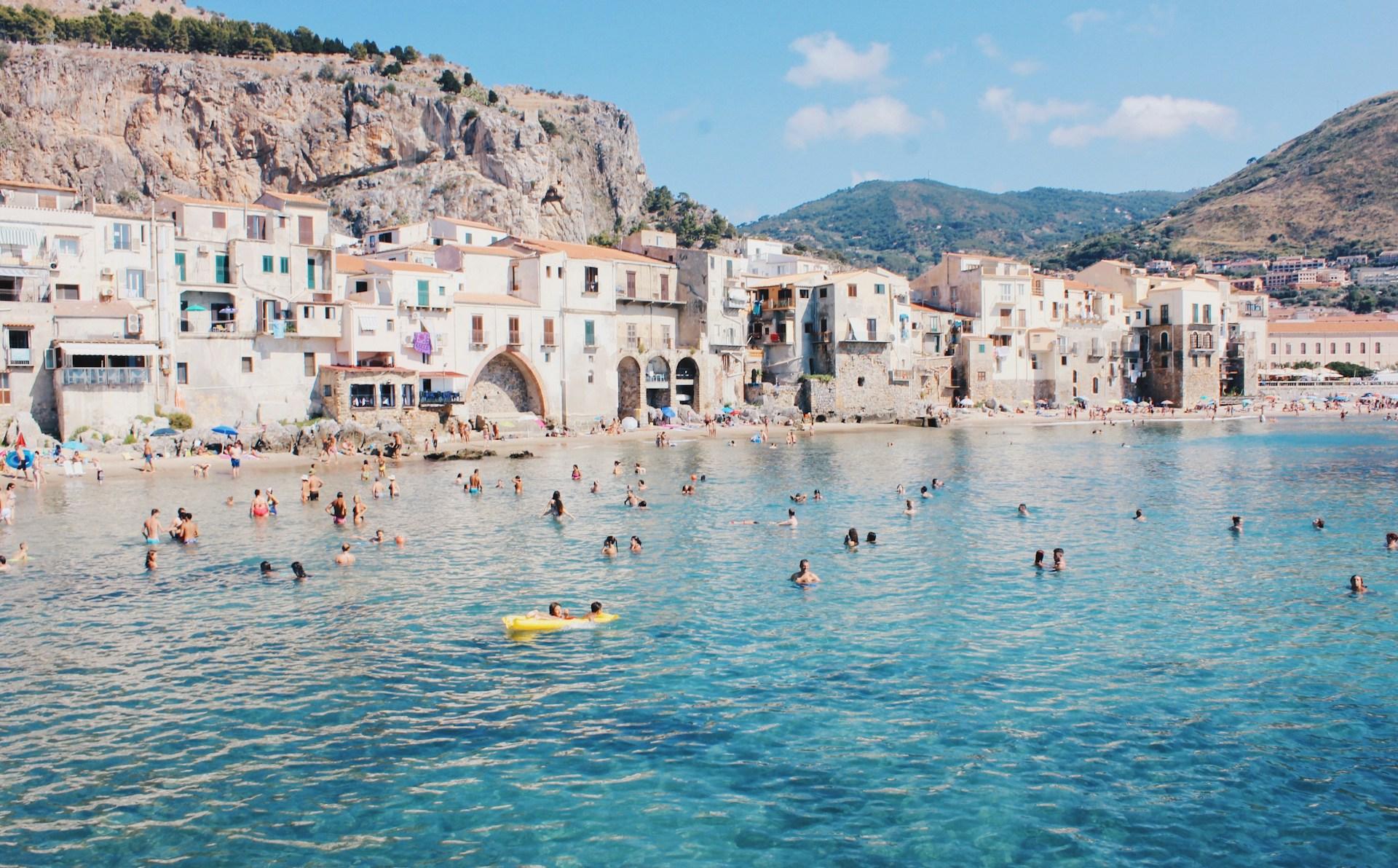 In Sicily, Tour Among Dream Beaches background